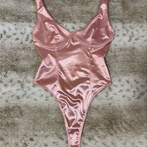 Sleek Pink Satin Bodysuit